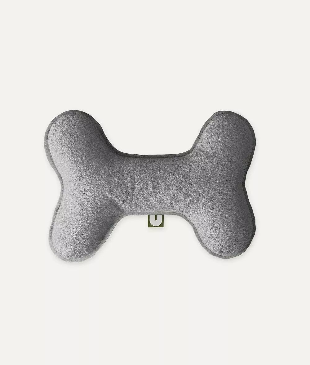 Graues knochenförmiges Hundespielzeug